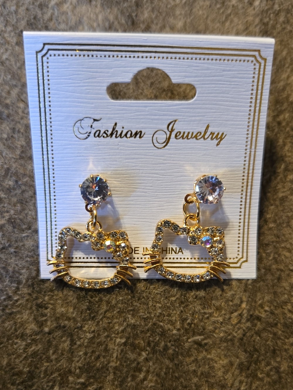 3/$10 Bundle Deals Gold Toned  Crystal Hello Kitty Outline Drop Earrings